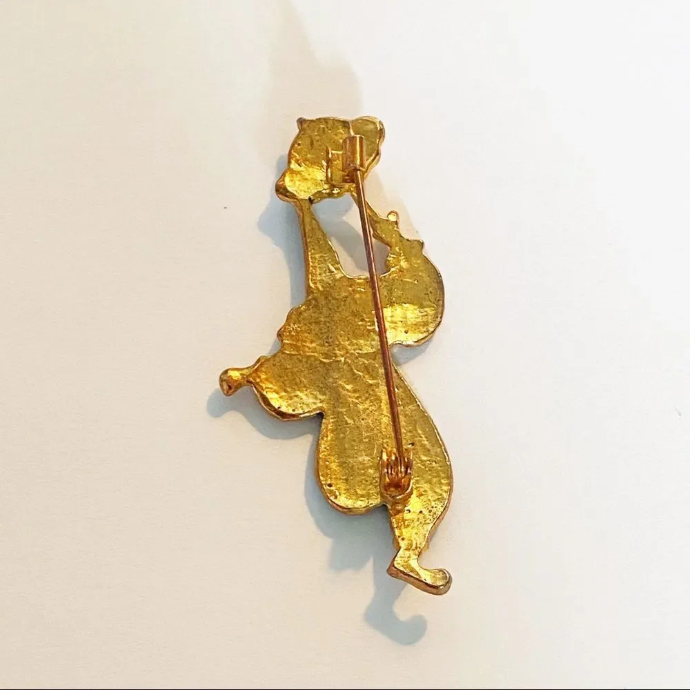 Vintage gold enamel rhinestone clown brooch
